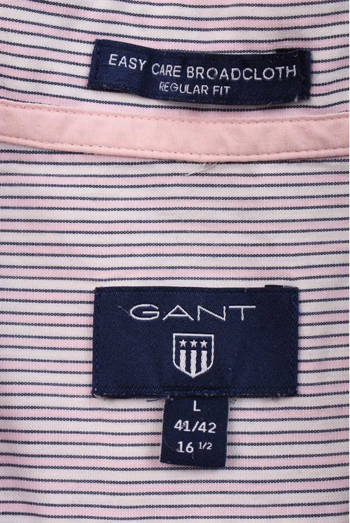Logo on the shirt, button up fastening.