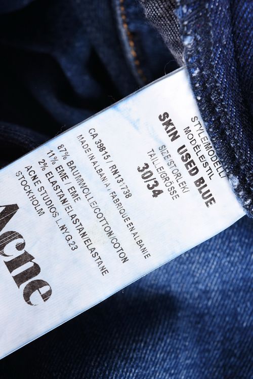 Logo on jeans, pockets, classic details of the brand.